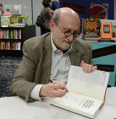 How many copies: Mal Warwick signing books at Kepler's