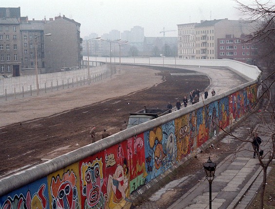 Photo of the Berlin Wall, behind which the critical events in this funny new spy novel took place