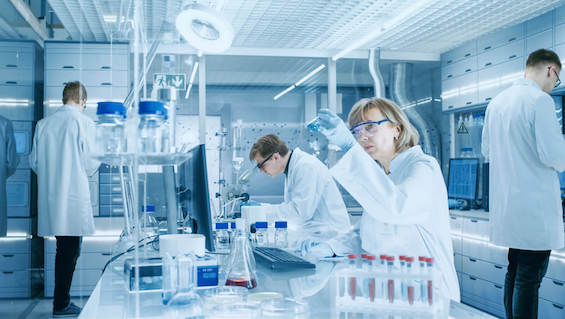 Photo of scientists at work in a biotech lab like those in the two biotech startups in this book