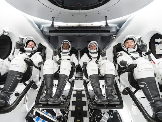Photo of NASA astronauts in a spacecraft like those in this novel  