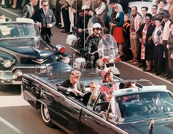 Photo of President and Mrs Kennedy shortly before his assassination, an event that doesn't happen in this novel about how JFK survived Dallas 