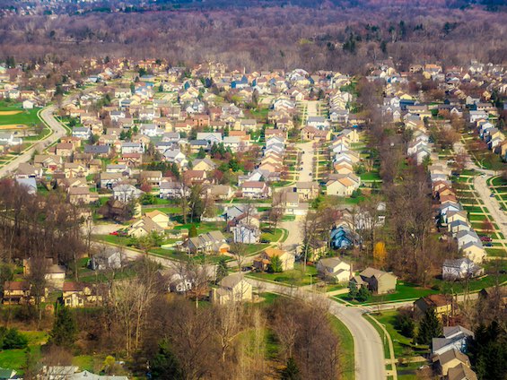 Aerial view of a suburban community like the one portrayed in this hopeful dystopian novel