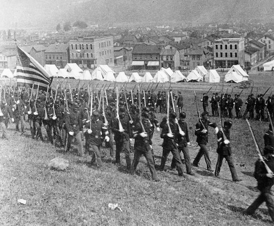 State militia entering Homestead, Pennsylvania, to put down the strike of July 1892 against Andrew Carnegie, one of the signal events in US economic history