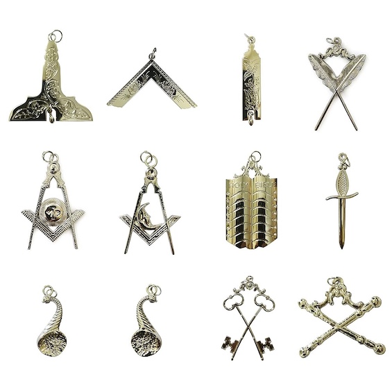 Photo of a set of silver Masonic collar pins, like those on display in a key scene in this popular detective series