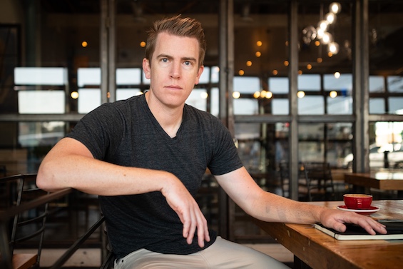 Photo of David McCloskey at a coffee shop, author of this novel that is spy fiction at its best