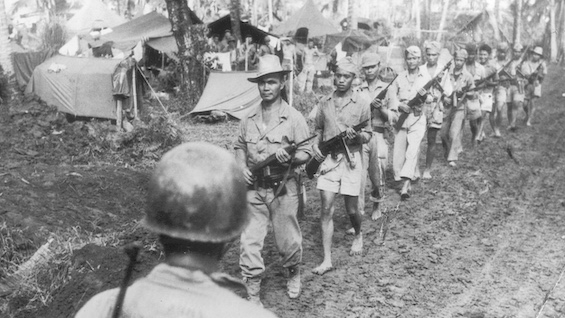 American army officer training Philippine volunteers in WWII like the man who became a hero of the Philippines