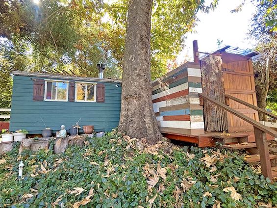 Photo of makeshift structures in a rural compound in this example of great suspense fiction