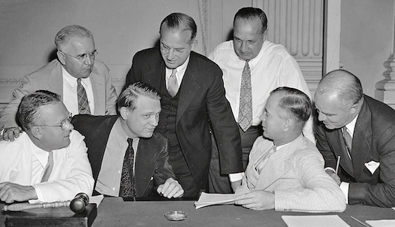 Photo of the members of the House Unamerican Activities Committee in 1950, a major factor in this mystery about a taxi-drivers' union