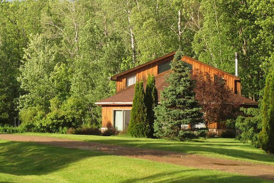 Photo of a cabin in the MInnesota woods like the one where a Russian hit team strikes