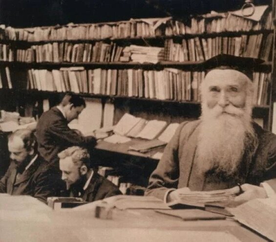 Image of Dr. James Murray and his assistants at work on the Oxford English Dictionary, which figures at the core of this feminist novel