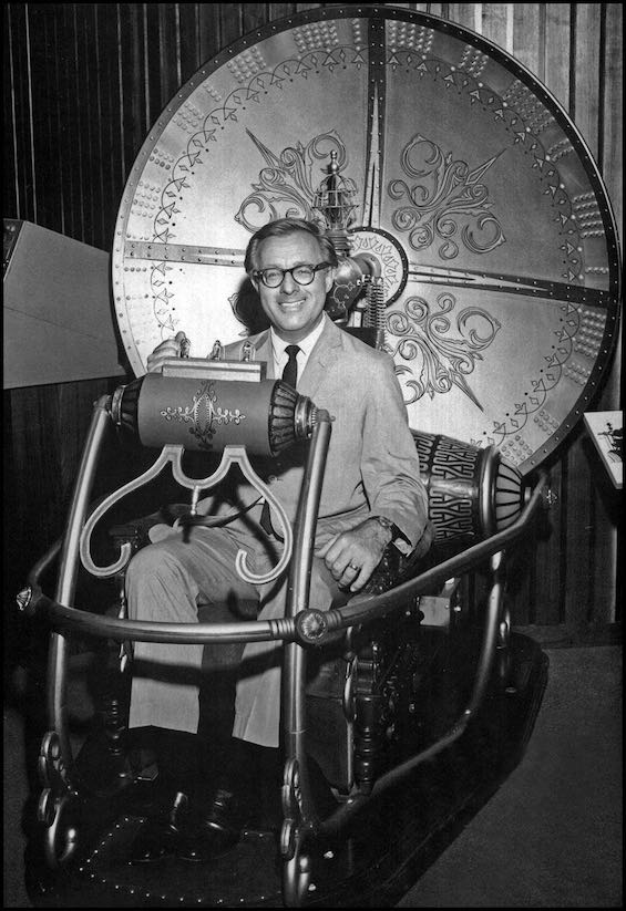 Photo of Ray Bradbury in a movie prop for a "time travel machine," a theme prominent in this novel about a pandemic