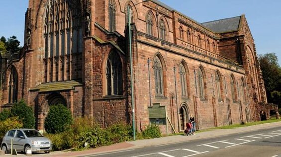 Recent image of Shrewsbury Abbey, the setting for this cozy mystery set in 12th-century England filled with unfamiliar language